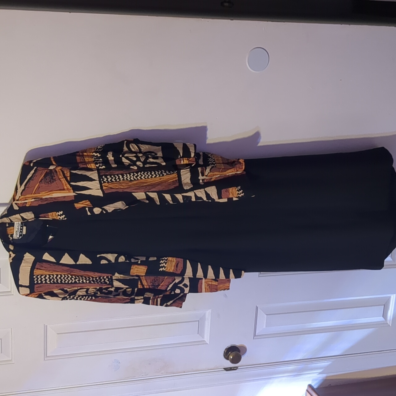 Black Dress With Geometric Patterned Jacket